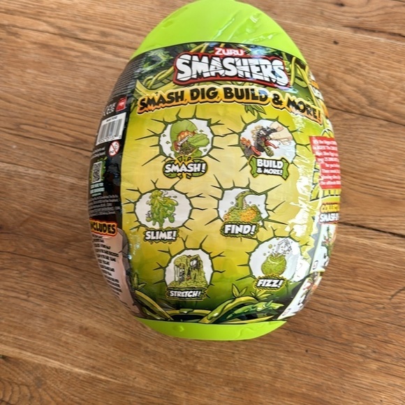 ZURU Smashers Mega Jurassic Light-Up Roaring Dino Toy Egg With 25 Surprises - Picture 3 of 3